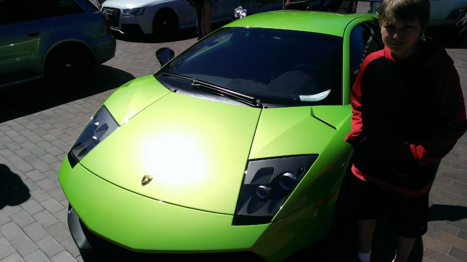 Young Luke with a Lamborghini